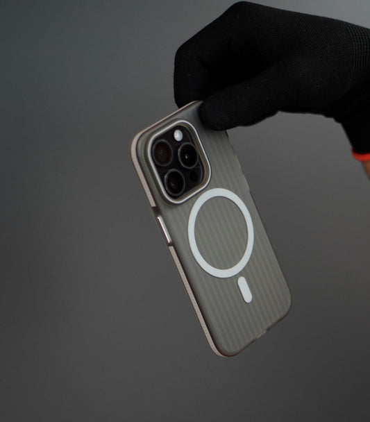 Close-up of striped corrugated hard iPhone case with MagSafe magnetic ring