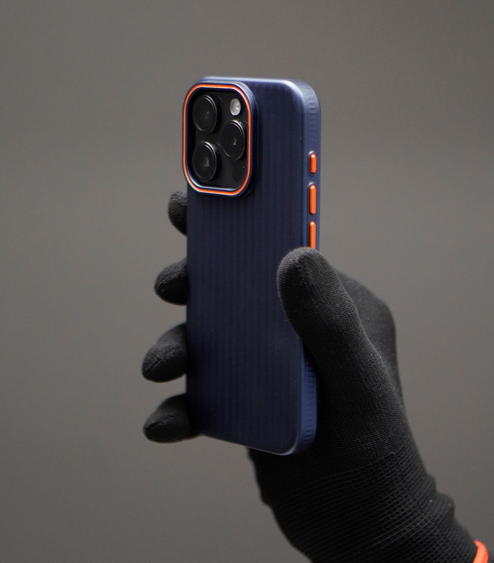 Durable navy blue case for iPhone with orange highlight and textured design