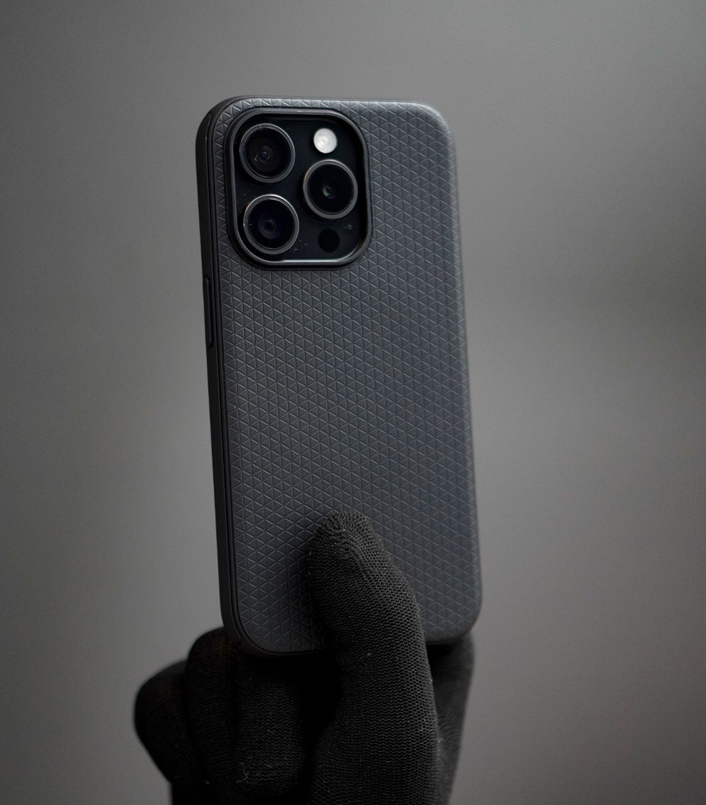 Matte black textured shockproof phone case with geometric grip pattern