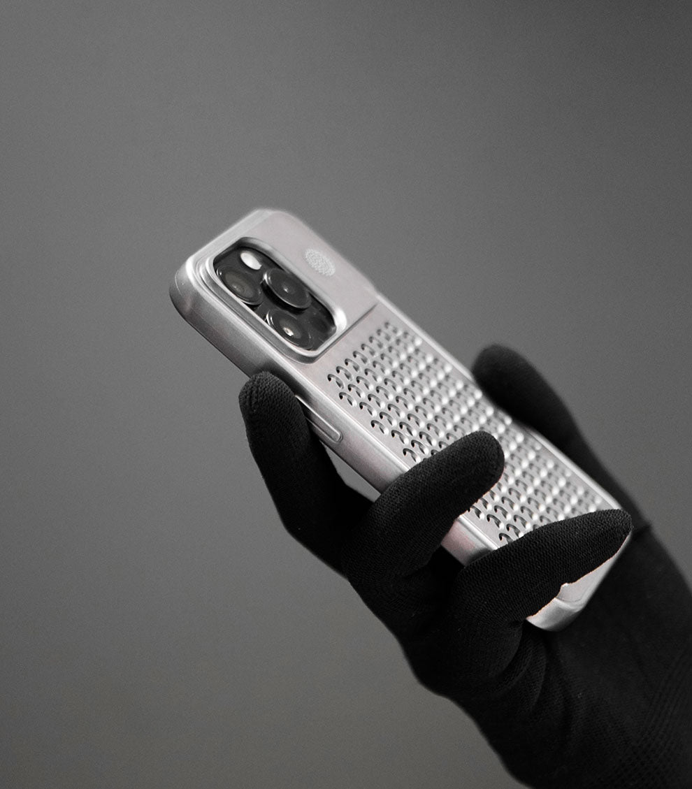 Minimalist grey phone case with perforated back design