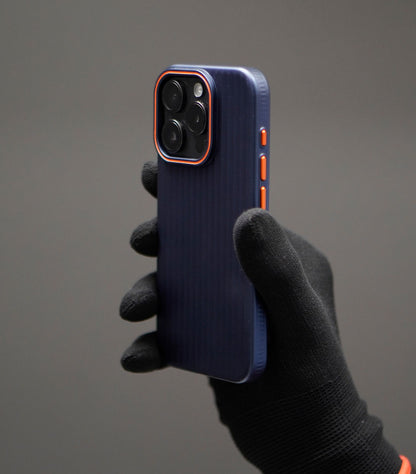 Durable navy blue case for iPhone with orange highlight and textured design