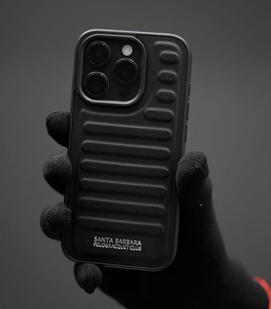 Luxury silicone case with ribbed pattern and protective design held by gloved hand