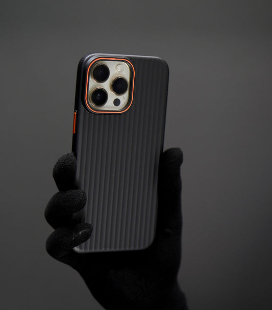 Matte black ribbed iPhone case with orange camera trim