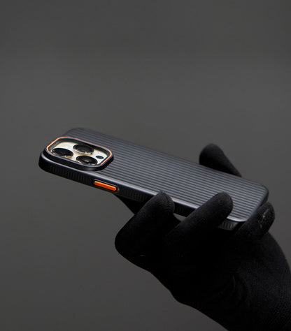 Protective iPhone case with textured grip and orange accent
